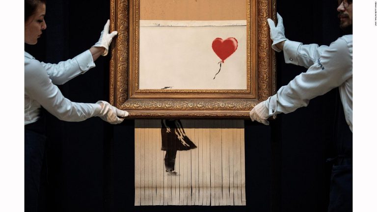 Subastan obra de Banksy que fue autodestruida por US$ 25,4 millones